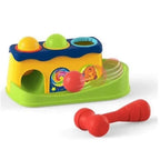 Knock-ball toy on a white background with the hammer and balls