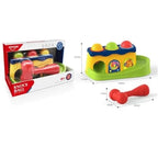 Knock-ball toy beside a dimensions card