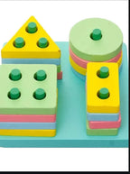 Four shape towers stacked on a square wooden base