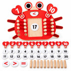 Crab math board with heart numbers, round answers 0–20, comparison signs and rods