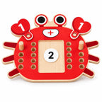 Wooden crab math board set out for play