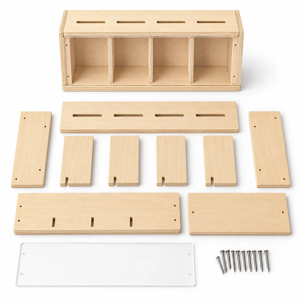 Wooden coin-bank kit pieces, clear panel, and nails before assembly
